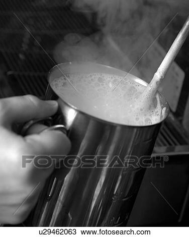 Cappuccino creamer View Large Photo Image Stock Image - Cappuccino creamer. Fotosearch