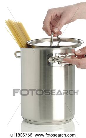 Stock Photograph - Cooking pot with spaghetti. Fotosearch
