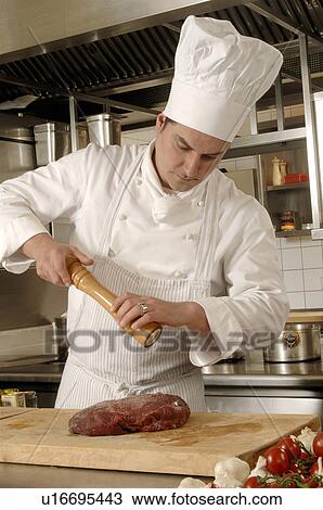 Stock Image - Cooking roast. Fotosearch