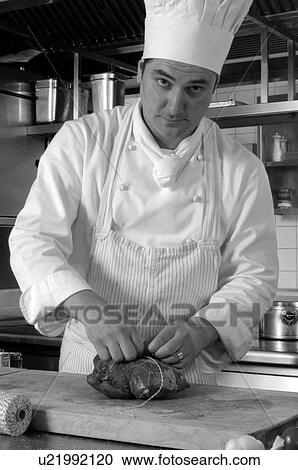 Stock Image - Cooking roast. Fotosearch