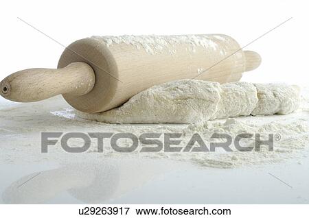 Stock Photo - Dough and rolling pin. Fotosearch