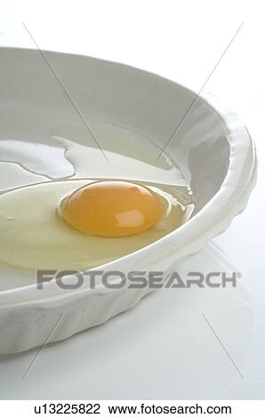 Egg in a bowl View Large Photo Image Stock Image - Egg in a bowl. Fotosearch