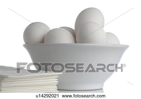 Stock Image - Eggs in a bowl. Fotosearch