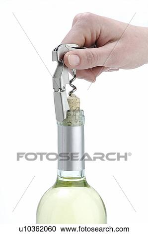 Stock Image - Open wine bottle with a waiter's corkscrew. Fotosearch