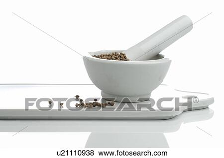 Pepper in a motar View Large Photo Image Stock Photo - Pepper in a motar. Fotosearch
