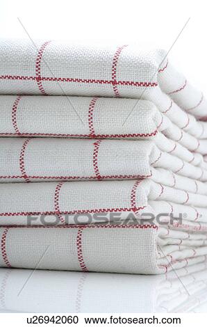 Stock Image - Stacked dish towels. Fotosearch