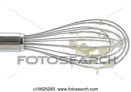 Stock Image - Whisk with dough. Fotosearch