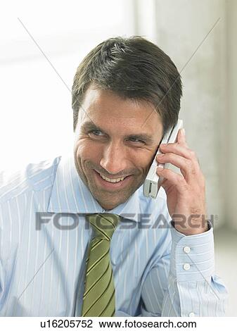 Business man is phoning View Large Photo Image Stock Image - Business man is phoning. Fotosearch