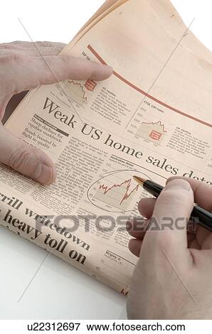 Stock Photo - Chart on financial newspaper. Fotosearch