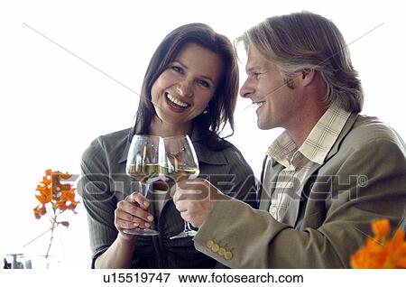 Couple drinking wine View Large Photo Image Stock Photo - Couple drinking wine. Fotosearch