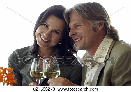 Couple drinking wine View Large Photo Image Stock Photo - Couple drinking wine. Fotosearch