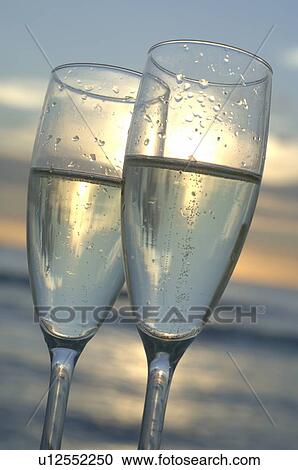 Stock Image - Two glasses of sparkling wine. Fotosearch