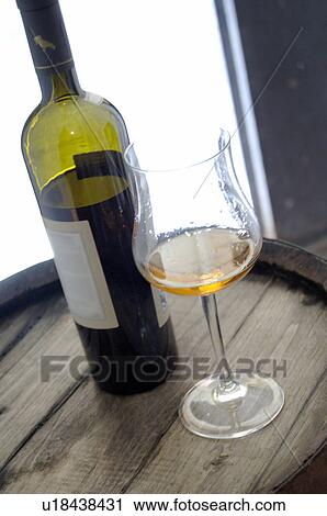 Stock Image - Wine bottle and glass. Fotosearch