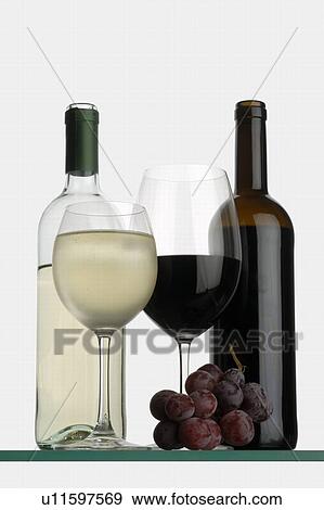 Stock Photo - Wine bottles and glasses. Fotosearch