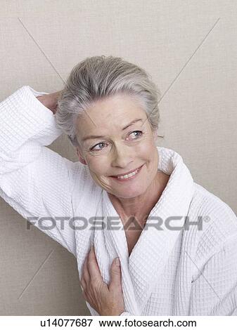Senior adult in bathrobe View Large Photo Image Stock Photo - Senior adult in bathrobe. Fotosearch