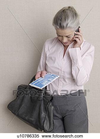 Senior adult in business clothing with laptop and credit card View Large Photo Image Stock Photography - Senior adult in business clothing with laptop and credit card. Fotosearch