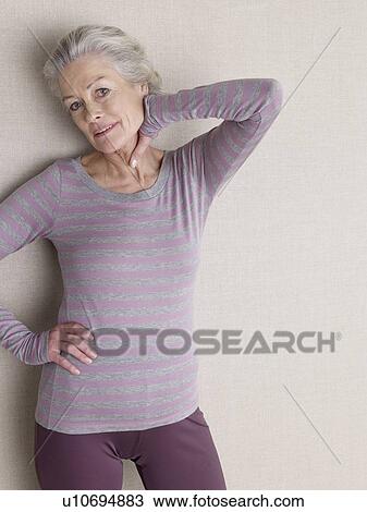Stock Image - Senior adult in sports clothing. Fotosearch
