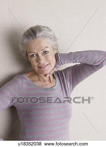 Stock Photo - Senior adult in sports clothing. Fotosearch