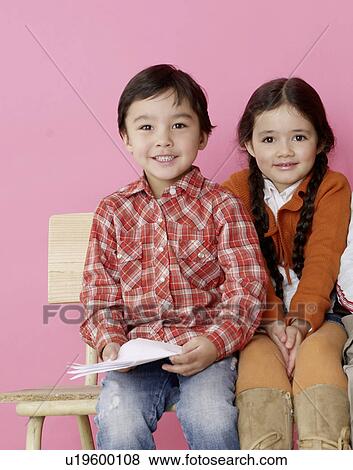 Stock Photo - Asian boy and girl with plait. Fotosearch
