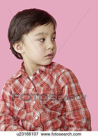 Stock Photo - Asian boy wearing a checked shirt. Fotosearch