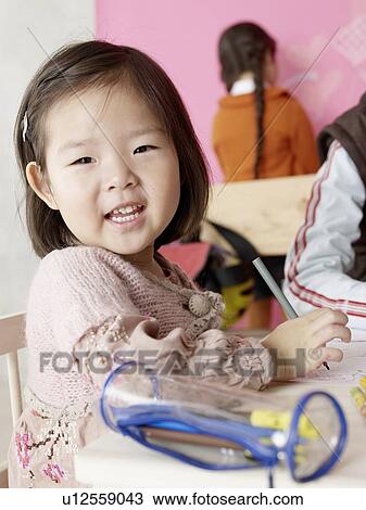 Asian girl with pencil case View Large Photo Image Stock Image - Asian girl with pencil case. Fotosearch