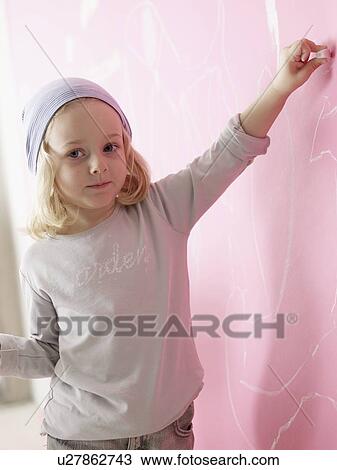 Blond girl wearing a headscarf is painting View Large Photo Image Stock Image - Blond girl wearing a headscarf is painting. Fotosearch
