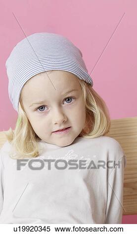 Stock Photography - Blond girl wearing a headscarf. Fotosearch
