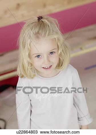 Stock Image - Blonde girl. Fotosearch