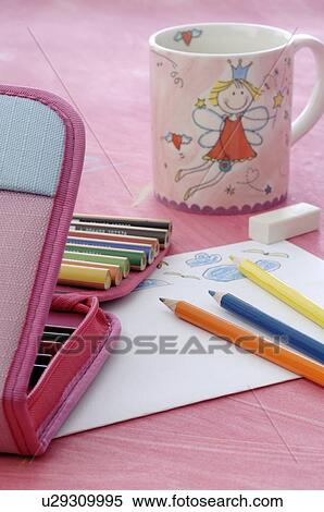 Stock Photography - Pencil case with crayons and mug. Fotosearch