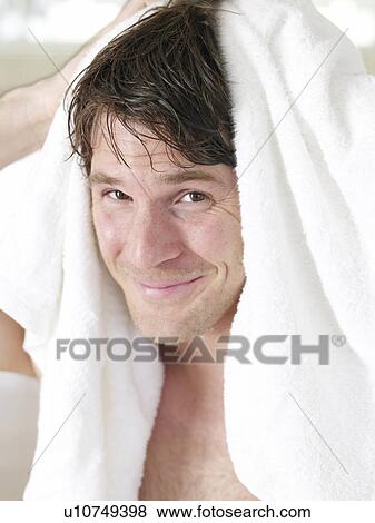 Man toweling himself View Large Photo Image Stock Photo - Man toweling himself. Fotosearch