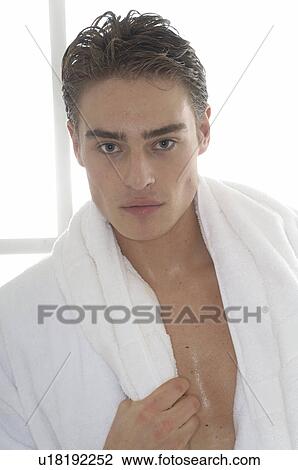 Stock Image - Man wearing bathrobe. Fotosearch