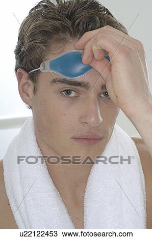 Man with a gel mask View Large Photo Image Stock Image - Man with a gel mask. Fotosearch