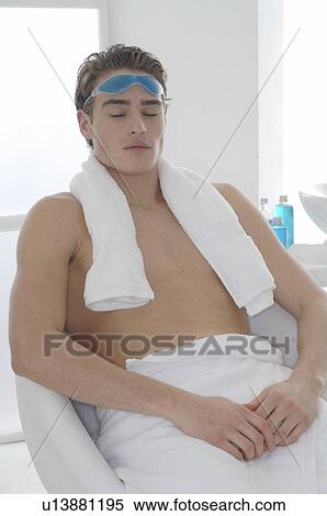 Stock Photography - Man with a gel mask. Fotosearch