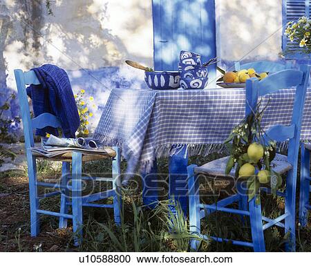 Stock Image - Blue and white table with lemon. Fotosearch