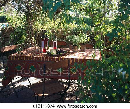 Setted garden table View Large Photo Image Picture - Setted garden table. Fotosearch