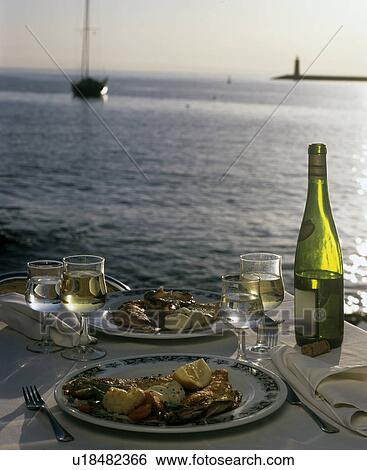 Table at the sea View Large Photo Image Stock Photograph - Table at the sea. Fotosearch