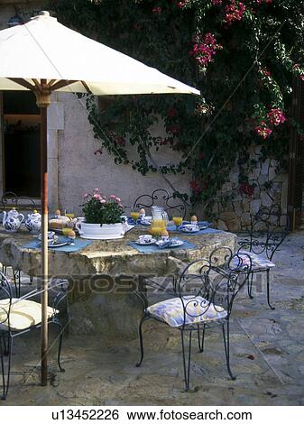 Stock Photograph - Table on mediterranean terrace. Fotosearch