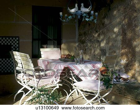 Terrace table on with pomegranate View Large Photo Image Stock Photo - Terrace table on with pomegranate. Fotosearch