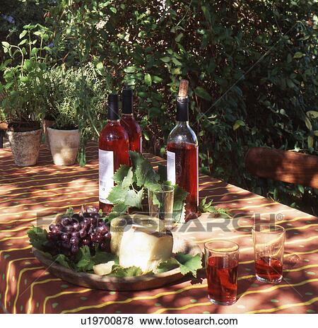 Stock Photo - Wine, cheese and grapes. Fotosearch