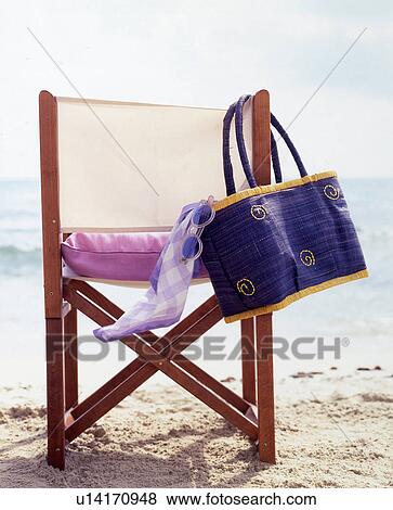 Beach chair and beach bag View Large Photo Image Stock Photo - Beach chair and beach bag. Fotosearch