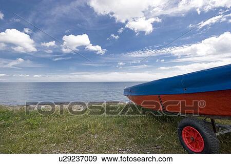 Stock Photo - Boat at the sea. Fotosearch