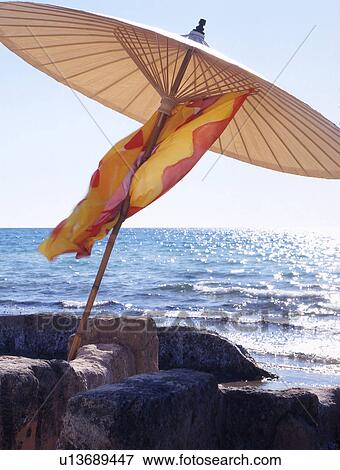 Stock Photo - Parasol at the sea. Fotosearch