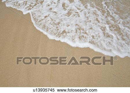 Stock Photography - Sea water on the beach. Fotosearch