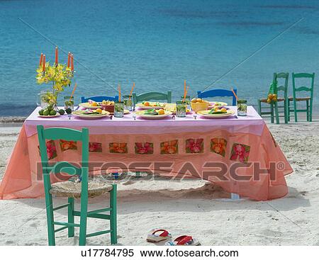 Table setting at the beach - holiday feeling View Large Photo Image Stock Photography - Table setting at the beach - holiday feeling. Fotosearch