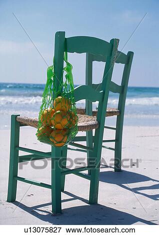 Two chairs at the beach View Large Photo Image Stock Photo - Two chairs at the beach. Fotosearch