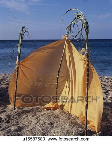 Stock Image - Windbreak on the beach. Fotosearch