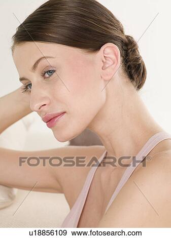 Stock Photo - Dark haired woman. Fotosearch