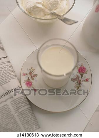 Stock Image - glass with milk. Fotosearch