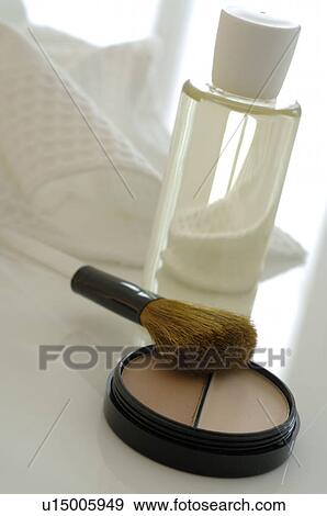 Stock Photo - Make-up with a brush. Fotosearch