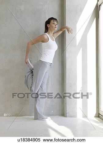 Stock Photography - streching the thigh. Fotosearch